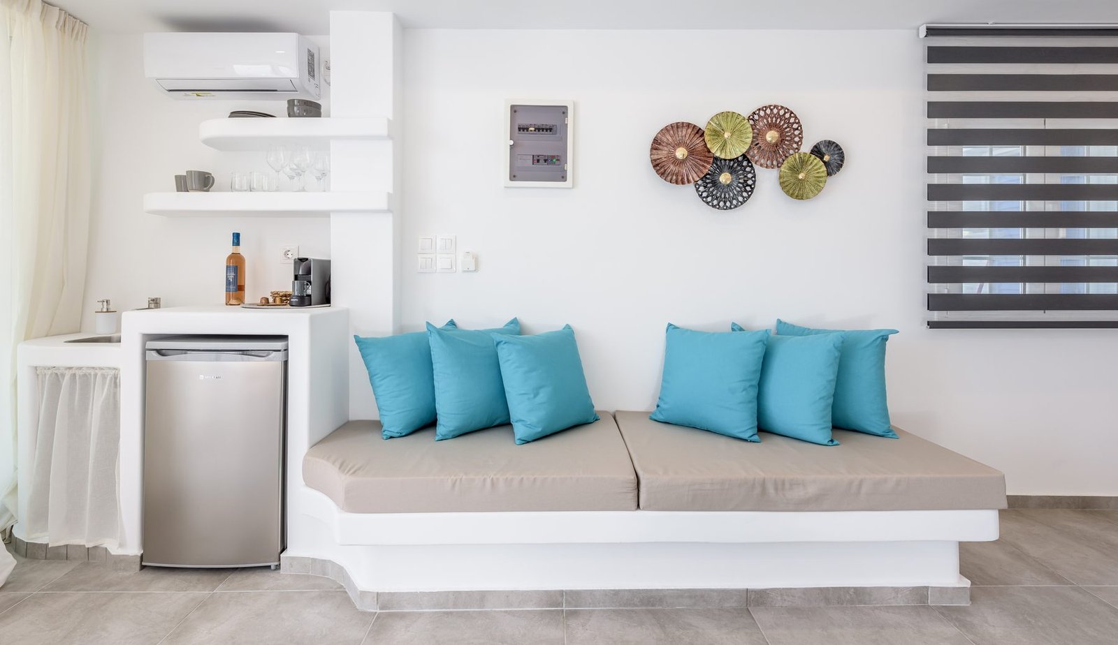 The kitchenette and the built-in bench